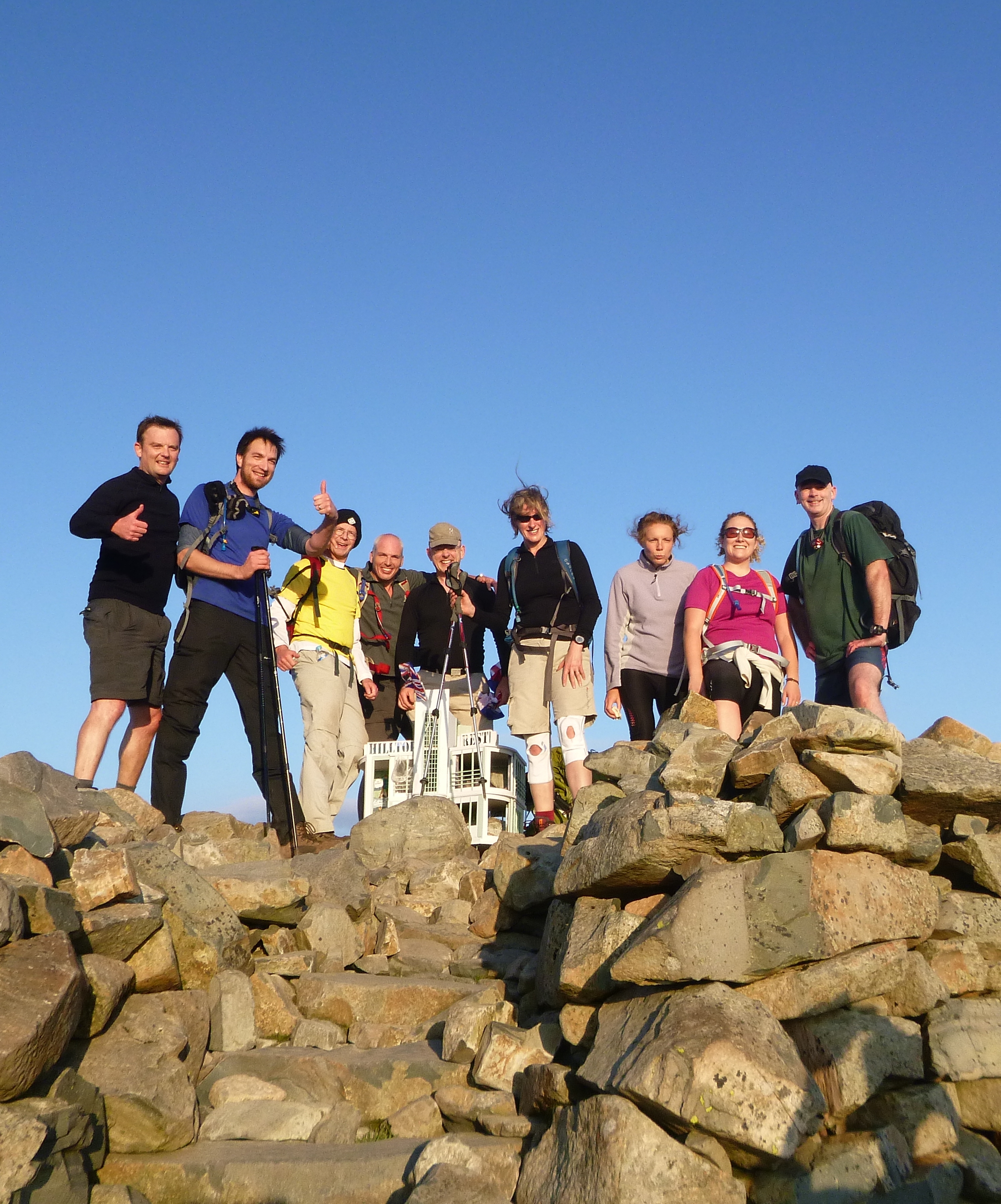 The LawNet Extreme Challenge team at the top of Scafell Peak, the second peak in their 24 hour challenge